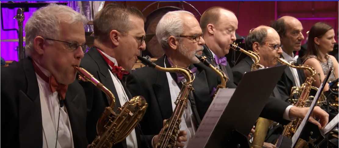 Steve playing saxophone with the NY Phil